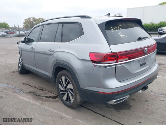 2024 Volkswagen Atlas 2.0T SE w/Technology with VIN 1V2JR2CA2RC563653, listed as a IAAI auction lot 41956579 with 35,356 mi miles. Bid and sale history available at carsss.com. Image 3.