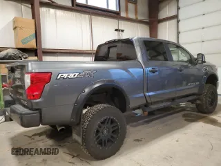 2016 Nissan Titan XD Platinum Reserve with VIN 1N6BA1F44GN503112, listed as a Copart auction lot 81138394 with 143,321 mi miles and Salvage Title. Bid and sale history available at carsss.com. Image 3.
