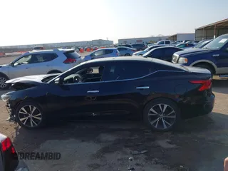 2016 Nissan Maxima 3.5 SV with VIN 1N4AA6APXGC404129, listed as a IAAI auction lot 41511017 with 143,428 mi miles. Bid and sale history available at carsss.com. Image 14.