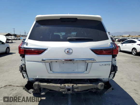 2020 Lexus LX 570 z VIN JTJDY7AX5L4319404, wystawiony jako Copart lot #69185424 z przebiegiem 46 324 mil mil oraz Szkoda całkowita • Salvage title. Historia ofert i sprzedaży dostępna na DreamBid. Obrazek 6.