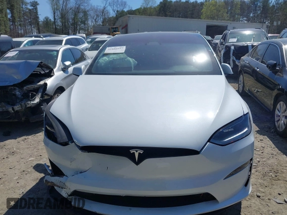 2023 Tesla Model X with VIN 7SAXCDE50PF414198, listed as a IAAI auction lot 41880957 with Not Provided miles and . Bid and sale history available at DreamBid. Image 11.