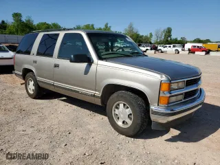 1999 Chevrolet Tahoe Limited with VIN 1GNEC13R5XR132083, listed as a Copart auction lot 54187405 with 167,548 mi miles and Clean Title. Bid and sale history available at carsss.com. Image 4.