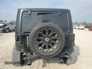 2018 Jeep Wrangler JK Unlimited Sport S with VIN 1C4BJWDGXJL908746, listed as a Copart auction lot 75881844 with 69,805 mi miles and Salvage Title. Bid and sale history available at carsss.com. Image 6.