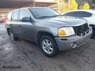 2005 GMC Envoy SLE with VIN 1GKDS13S352215032, listed as a IAAI auction lot 41221612 with 260,647 mi miles. Bid and sale history available at carsss.com. Image 1.