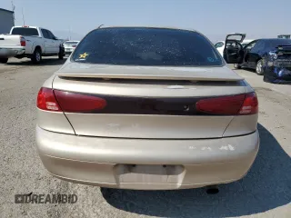 1999 Ford Escort SE with VIN 1FAFP13P7XW177713, listed as a Copart auction lot 70439304 with 125,781 mi miles and Salvage Title. Bid and sale history available at carsss.com. Image 6.