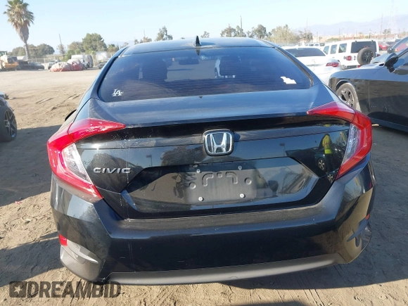2017 Honda Civic EX z VIN 2HGFC2F75HH519233, wystawiony jako IAAI lot #40375565 z przebiegiem 133 660 mil mil oraz . Historia ofert i sprzedaży dostępna na DreamBid. Obrazek 16.