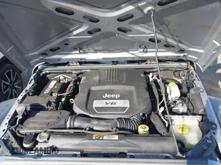 2015 Jeep Wrangler Unlimited Sport with VIN 1C4BJWDG4FL732123, listed as a IAAI auction lot 41864714 with 142,382 mi miles. Bid and sale history available at carsss.com. Image 10.