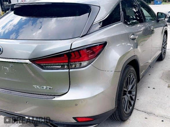 2022 Lexus RX with VIN 2T2YGMDA4NC072921, listed as a Copart auction lot 73366674 with 13,262 mi miles and Clean Title. Bid and sale history available at carsss.com. Image 4.