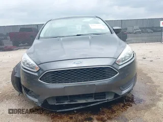 2018 Ford Focus SE z VIN 1FADP3F23JL321768, wystawiony jako IAAI lot #42415788 z przebiegiem 124 126 mil mil oraz . Historia ofert i sprzedaży dostępna na DreamBid. Obrazek 12.
