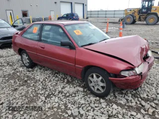 1996 Ford Escort z VIN 3FASP11J6TR151727, wystawiony jako Copart lot #55487725 z przebiegiem 118 276 mil mil oraz Nie do naprawy. Historia ofert i sprzedaży dostępna na DreamBid. Obrazek 4.