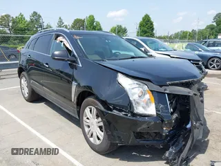 2014 Cadillac SRX Luxury Collection z VIN 3GYFNBE32ES582204, wystawiony jako IAAI lot #42253969 z przebiegiem 124 708 mil mil oraz . Historia ofert i sprzedaży dostępna na DreamBid. Obrazek 1.
