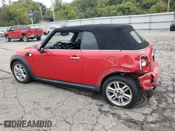 2011 MINI Convertible with VIN WMWZN3C51BTZ78331, listed as a Copart auction lot 73348304 with 94,219 mi miles and Salvage title. Bid and sale history available at DreamBid. Image 2.