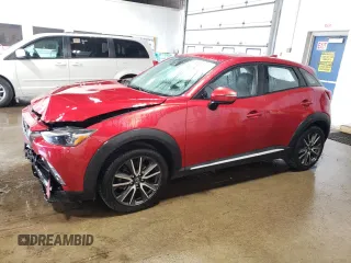 2017 Mazda CX-3 Grand Touring z VIN JM1DKFD70H0148182, wystawiony jako Copart lot #59032435 z przebiegiem 70 166 mil mil oraz Szkody całkowita. Historia ofert i sprzedaży dostępna na DreamBid. Obrazek 1.
