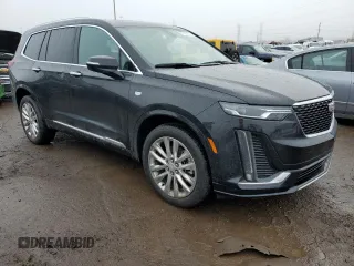 2021 Cadillac XT6 Premium Luxury z VIN 1GYKPDRS8MZ103159, wystawiony jako Copart lot #73400792 z przebiegiem 54 365 mil mil oraz . Historia ofert i sprzedaży dostępna na DreamBid. Obrazek 4.