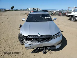 2020 BMW 3 Series 330i with VIN WBA5R1C02LFH39000, listed as a Copart auction lot 46874295 with Not provided miles and Salvage title. Bid and sale history available at DreamBid. Image 5.