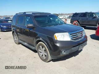 2012 Honda Pilot Touring with VIN 5FNYF4H99CB069996, listed as a IAAI auction lot 41809046 with 140,836 mi miles and . Bid and sale history available at DreamBid. Image 1.