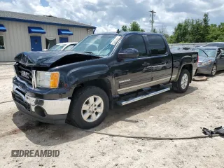 2010 GMC Sierra 1500 SLT with VIN 3GTRKWE36AG200689, listed as a Copart auction lot 61415905 with 158,417 mi miles and Salvage title. Bid and sale history available at DreamBid. Image 1.