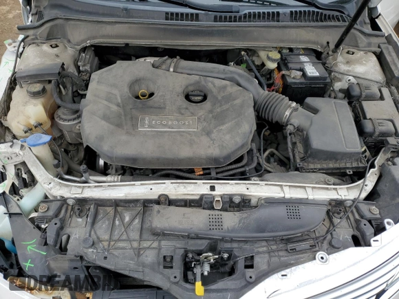 2014 Lincoln MKZ z VIN 3LN6L2G93ER811683, wystawiony jako Copart lot #52004485 z przebiegiem 188 134 mil mil oraz Szkoda całkowita • Salvage title. Historia ofert i sprzedaży dostępna na DreamBid. Obrazek 11.
