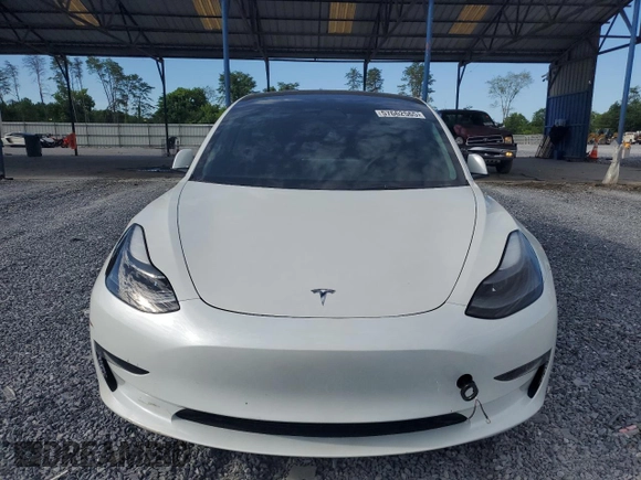 2023 Tesla Model 3 z VIN 5YJ3E1EA7PF573852, wystawiony jako Copart lot #57662565 z przebiegiem Nie podano mil oraz Szkoda całkowita • Salvage title. Historia ofert i sprzedaży dostępna na DreamBid. Obrazek 5.