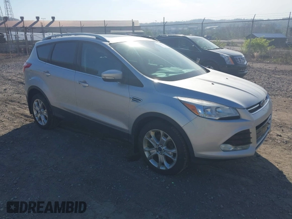 2016 Ford Escape Titanium with VIN 1FMCU9JX2GUA50916, listed as a IAAI auction lot 42118711 with 121,405 mi miles. Bid and sale history available at carsss.com. Image 1.