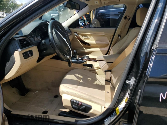 2015 BMW 3 Series 328i xDrive with VIN WBA3B5C59FP653564, listed as a Copart auction lot 64702115 with 92,821 mi miles and Salvage title. Bid and sale history available at DreamBid. Image 7.