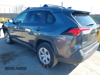 2019 Toyota RAV4 LE with VIN JTMG1RFV3KD025974, listed as a IAAI auction lot 41879264 with 131,933 mi miles and . Bid and sale history available at DreamBid. Image 3.