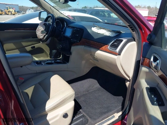 2012 Jeep Grand Cherokee Limited with VIN 1C4RJFBG8CC240952, listed as a IAAI auction lot 41807600 with 175,233 mi miles. Bid and sale history available at carsss.com. Image 5.