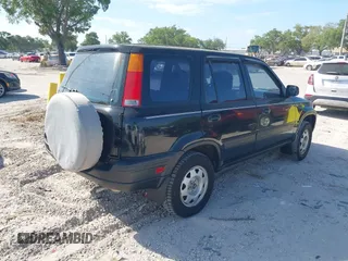 1998 Honda CR-V LX with VIN JHLRD2846WC018947, listed as a IAAI auction lot 41912066 with 112,454 mi miles. Bid and sale history available at carsss.com. Image 4.