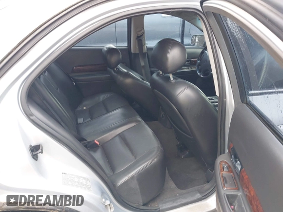 2002 Lincoln LS w/Base Pkg with VIN 1LNHM87A12Y607979, listed as a IAAI auction lot 41523445 with 174,826 mi miles. Bid and sale history available at carsss.com. Image 8.