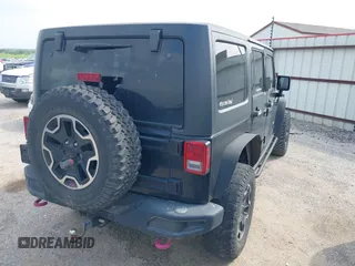 2015 Jeep Wrangler Unlimited Rubicon z VIN 1C4BJWFG2FL572417, wystawiony jako IAAI lot #41895927 z przebiegiem 54 981 mil mil oraz . Historia ofert i sprzedaży dostępna na DreamBid. Obrazek 4.