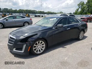 2014 Cadillac CTS Luxury RWD with VIN 1G6AR5SX6E0133230, listed as a Copart auction lot 60188995 with 116,230 mi miles and Salvage title. Bid and sale history available at DreamBid. Image 1.