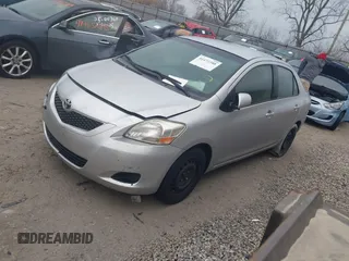 2012 Toyota Yaris with VIN JTDBT4K31C1419844, listed as a IAAI auction lot 41472388 with 236,204 mi miles. Bid and sale history available at carsss.com. Image 2.