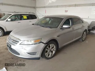 2011 Ford Taurus SEL with VIN 1FAHP2EW6BG170287, listed as a IAAI auction lot 42191702 with 199,477 mi miles. Bid and sale history available at carsss.com. Image 2.