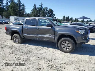 2017 Toyota Tacoma SR5 with VIN 3TMCZ5ANXHM052092, listed as a Copart auction lot 64898135 with 95,743 mi miles and Salvage title. Bid and sale history available at DreamBid. Image 4.