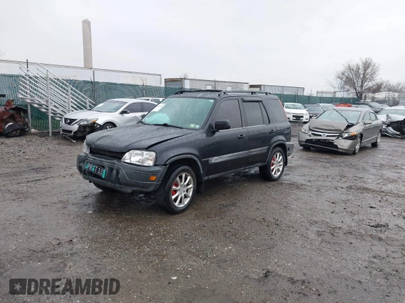 2000 Honda CR-V EX with VIN JHLRD1867YC001167, listed as a IAAI auction lot 41864832 with 238,941 mi miles. Bid and sale history available at carsss.com. Image 2.