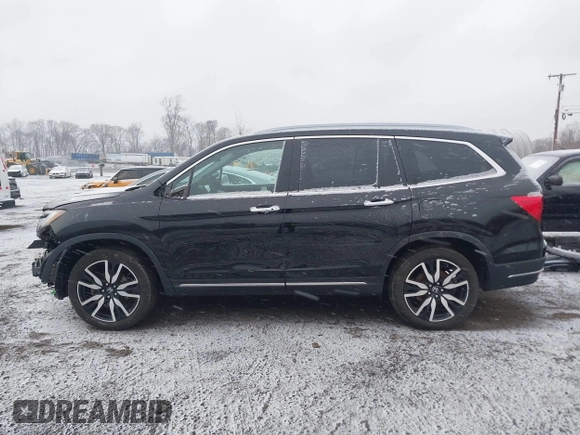 2022 Honda Pilot Touring 7-Passenger with VIN 5FNYF6H60NB005155, listed as a IAAI auction lot 41249979 with 65,712 mi miles. Bid and sale history available at carsss.com. Image 15.