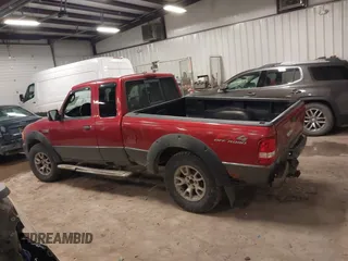 2009 Ford Ranger XLT with VIN 1FTZR45E49PA11760, listed as a IAAI auction lot 41694586 with 56,863 mi miles. Bid and sale history available at carsss.com. Image 14.