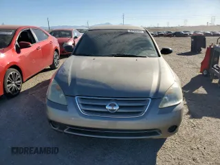 2002 Nissan Altima SL with VIN 1N4AL11DX2C261503, listed as a Copart auction lot 87508405 with 142,622 mi miles and Salvage Title. Bid and sale history available at carsss.com. Image 5.