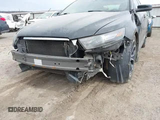 2013 Ford Taurus SHO z VIN 1FAHP2KT6DG174191, wystawiony jako IAAI lot #41752293 z przebiegiem 147 607 mil mil oraz . Historia ofert i sprzedaży dostępna na DreamBid. Obrazek 6.