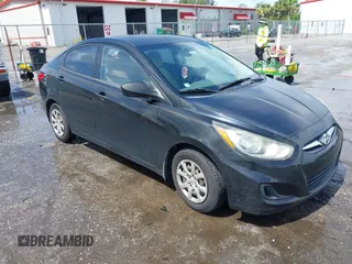 2012 Hyundai Accent GLS with VIN KMHCT4AEXCU122850, listed as a IAAI auction lot 42832006 with 144,339 mi miles and . Bid and sale history available at DreamBid. Image 1.