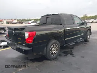 2021 Nissan Titan SV with VIN 1N6AA1EF4MN503458, listed as a IAAI auction lot 42401074 with 53,558 mi miles and . Bid and sale history available at DreamBid. Image 4.