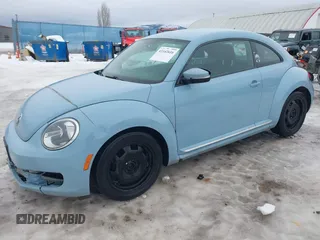 2012 Volkswagen Beetle 2.5L PZEV with VIN 3VWJP7AT7CM605780, listed as a IAAI auction lot 41142616 with 177,768 mi miles. Bid and sale history available at carsss.com. Image 2.