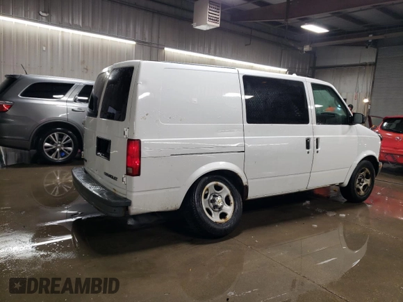 2003 Chevrolet Astro Cargo with VIN 1GCDM19X53B103984, listed as a Copart auction lot 46184145 with 214,147 mi miles and Salvage Title. Bid and sale history available at carsss.com. Image 3.