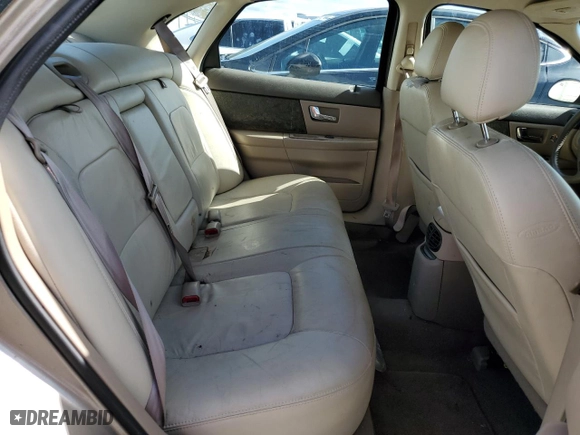 2002 Ford Taurus SEL Deluxe with VIN 1FAHP56S92G122795, listed as a Copart auction lot 73642794 with 82,785 mi miles and Salvage Title. Bid and sale history available at carsss.com. Image 10.