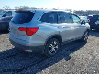 2016 Honda Pilot EX-L with VIN 5FNYF6H50GB092999, listed as a IAAI auction lot 41462504 with 141,604 mi miles. Bid and sale history available at carsss.com. Image 4.