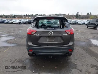 2016 Mazda CX-5 Touring with VIN JM3KE4CY5G0695242, listed as a IAAI auction lot 41795135 with 195,162 mi miles. Bid and sale history available at carsss.com. Image 15.