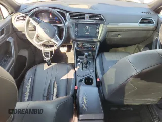 2023 Volkswagen Tiguan SE R-Line Black with VIN 3VVCB7AX3PM056471, listed as a Copart auction lot 60679225 with 94,752 mi miles and Clean title. Bid and sale history available at DreamBid. Image 8.