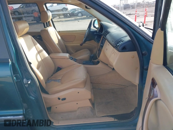 1998 Mercedes-Benz M-Class with VIN 4JGAB54E7WA034632, listed as a IAAI auction lot 41523291 with 153,241 mi miles. Bid and sale history available at carsss.com. Image 5.
