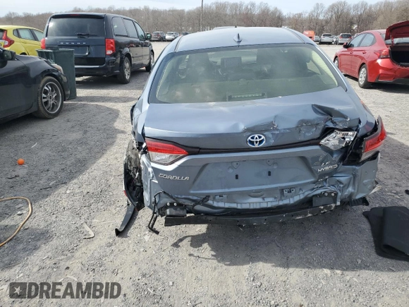2023 Toyota Corolla Hybrid LE with VIN JTDBDMHE6PJ002943, listed as a Copart auction lot 49856805 with 20,700 mi miles and Salvage Title. Bid and sale history available at carsss.com. Image 6.