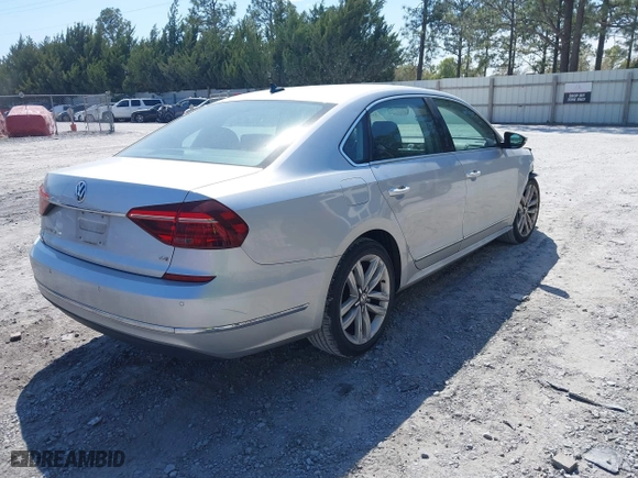 2017 Volkswagen Passat 1.8T SE w/Technology with VIN 1VWGT7A3XHC025096, listed as a IAAI auction lot 41891297 with 124,375 mi miles. Bid and sale history available at carsss.com. Image 4.